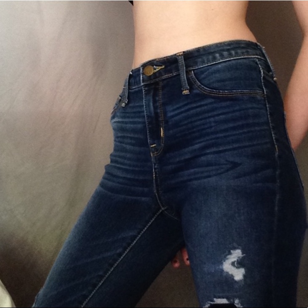 Distressed medium wash high waisted jeans